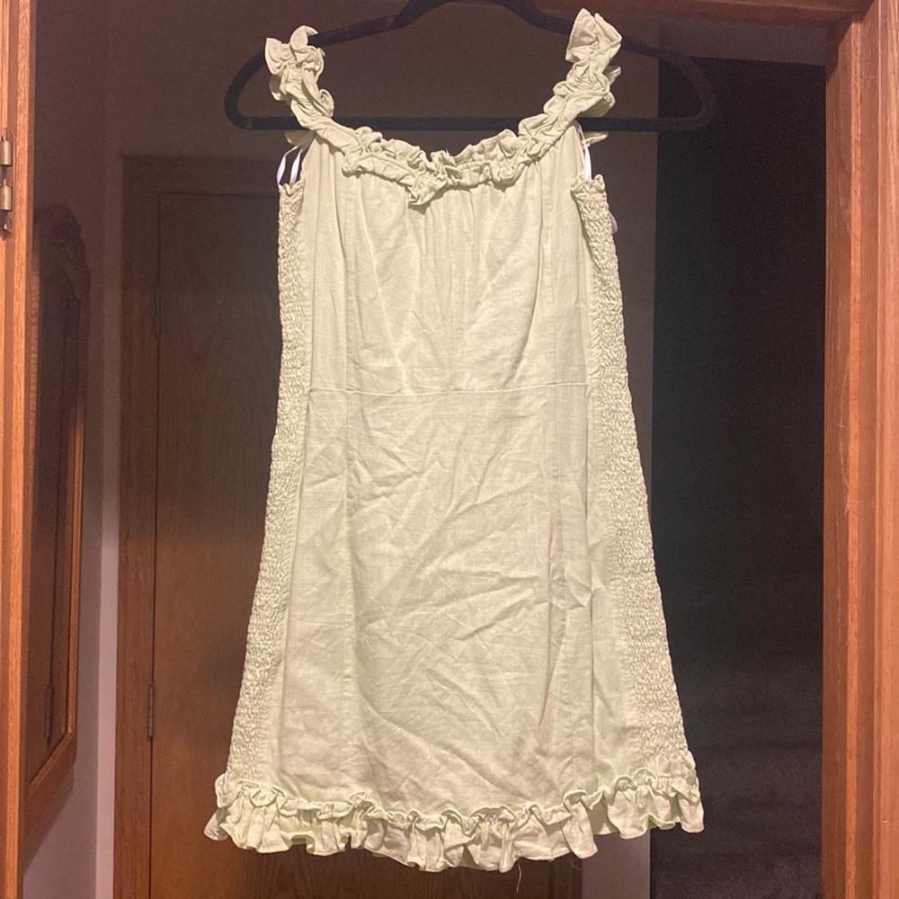 Bodycon minidress, strap can be off shoulder or on, zipper closure off back